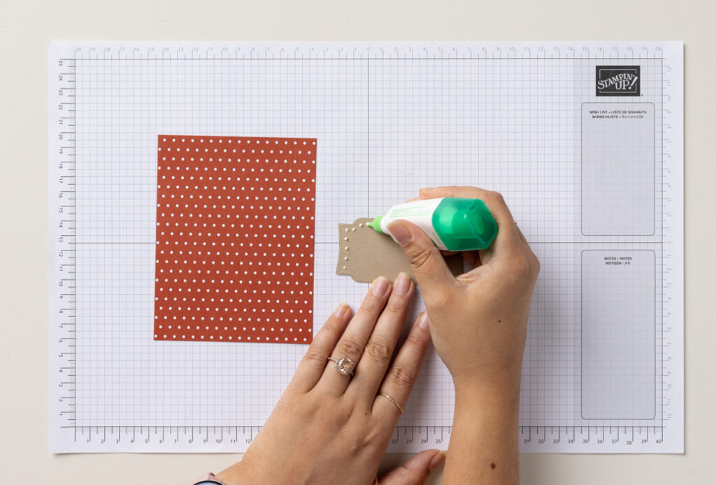 Another technique is to dot the glue along the edge of the paper. This dotting method helps control the amount of glue while still being effective in attaching pieces together.