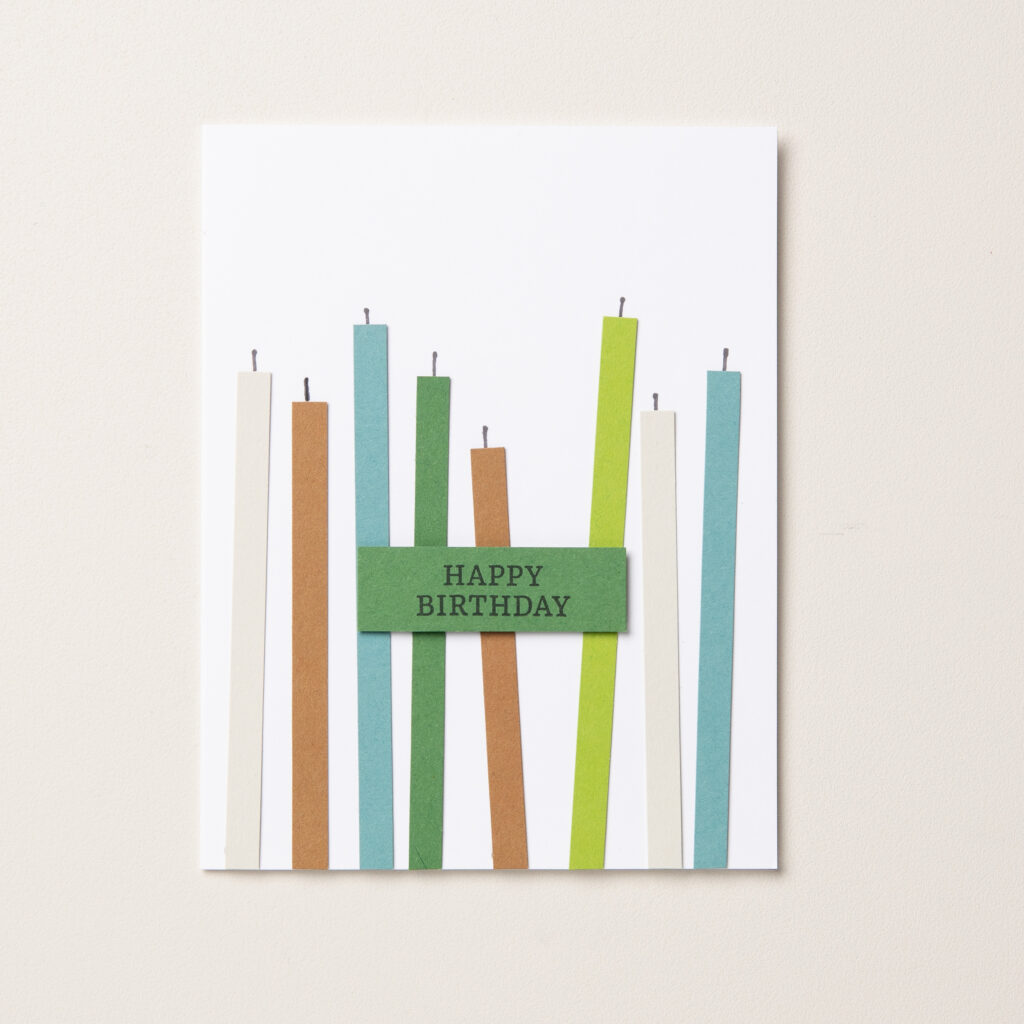 For a card like this, double-sided tape makes attaching thin strips of paper a piece of cake.