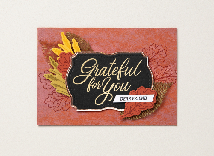 A handmade grateful for you card featuring leaves and thoughtful message.