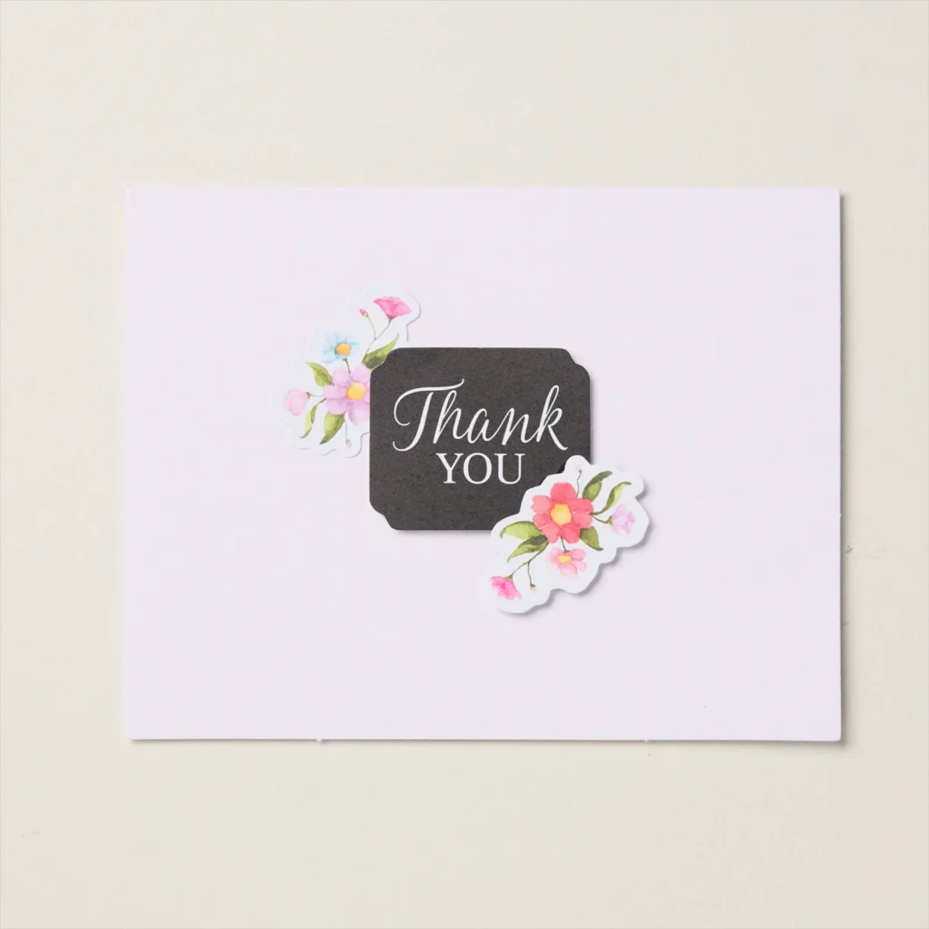 This card comes together quickly by combining a “Thank You” message from the Greetings For All pack with florals from the Celebrate Love pack.