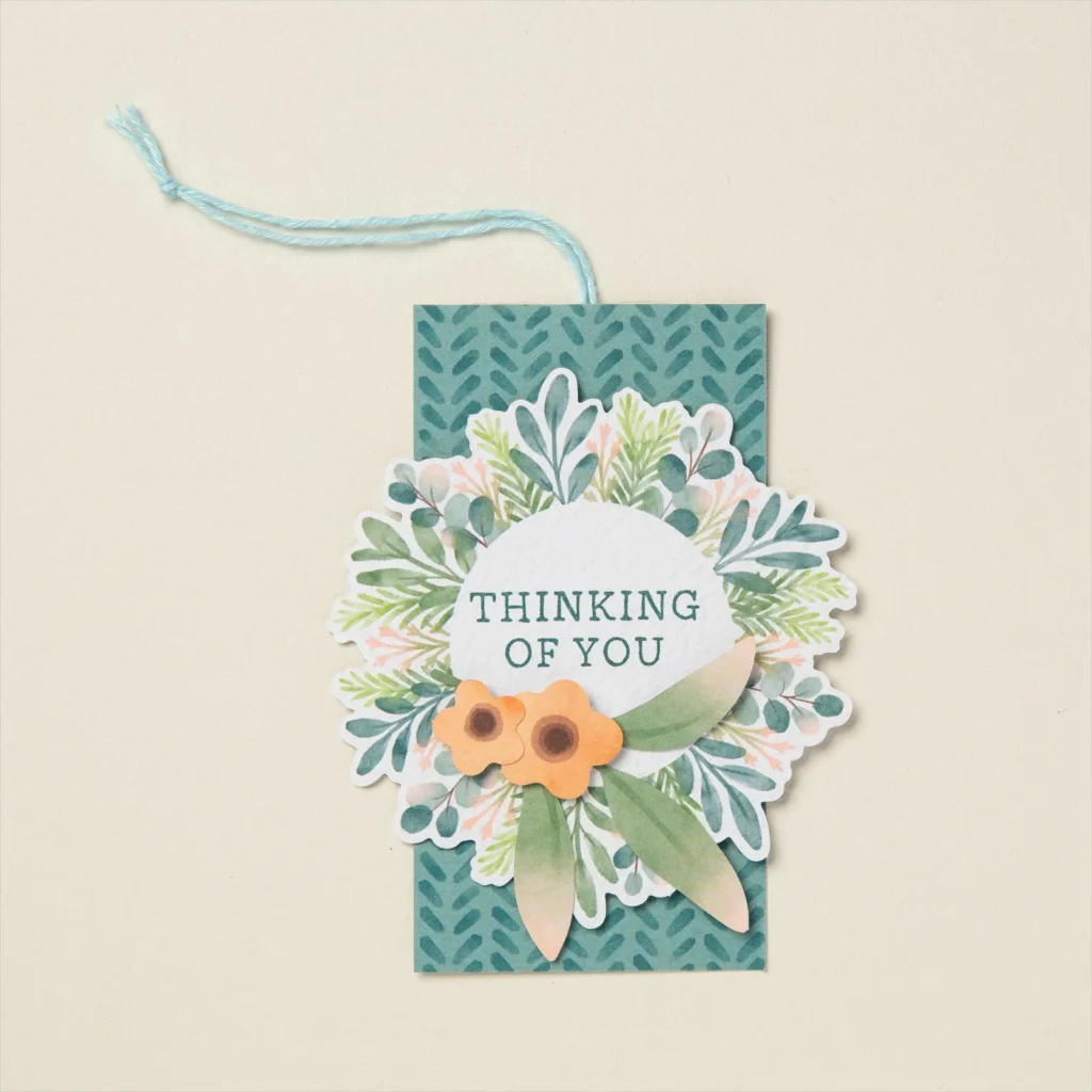 Use an edge tag topper punch to turn any small piece of paper into an elegant thank you gift tag.