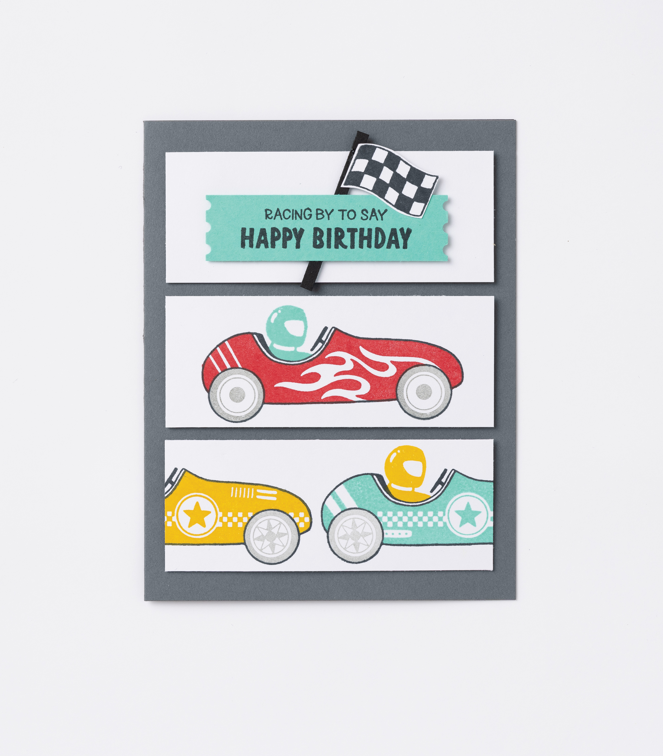 A cute handmade card featuring racing cars for a child.