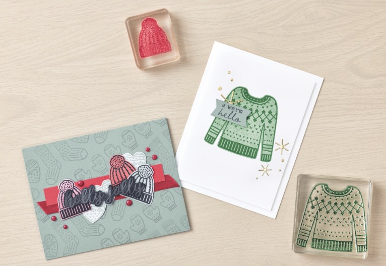 Holiday themed cards with clear stamp blocks of a sweater and a hat.