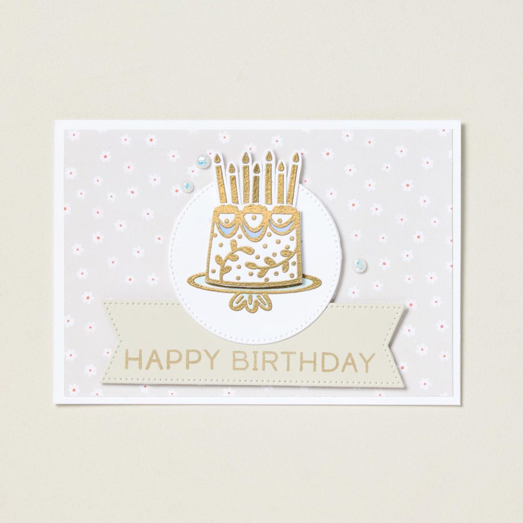 Elegant handmade birthday card with a gold embossed birthday cake, candles, and a Happy Birthday banner.