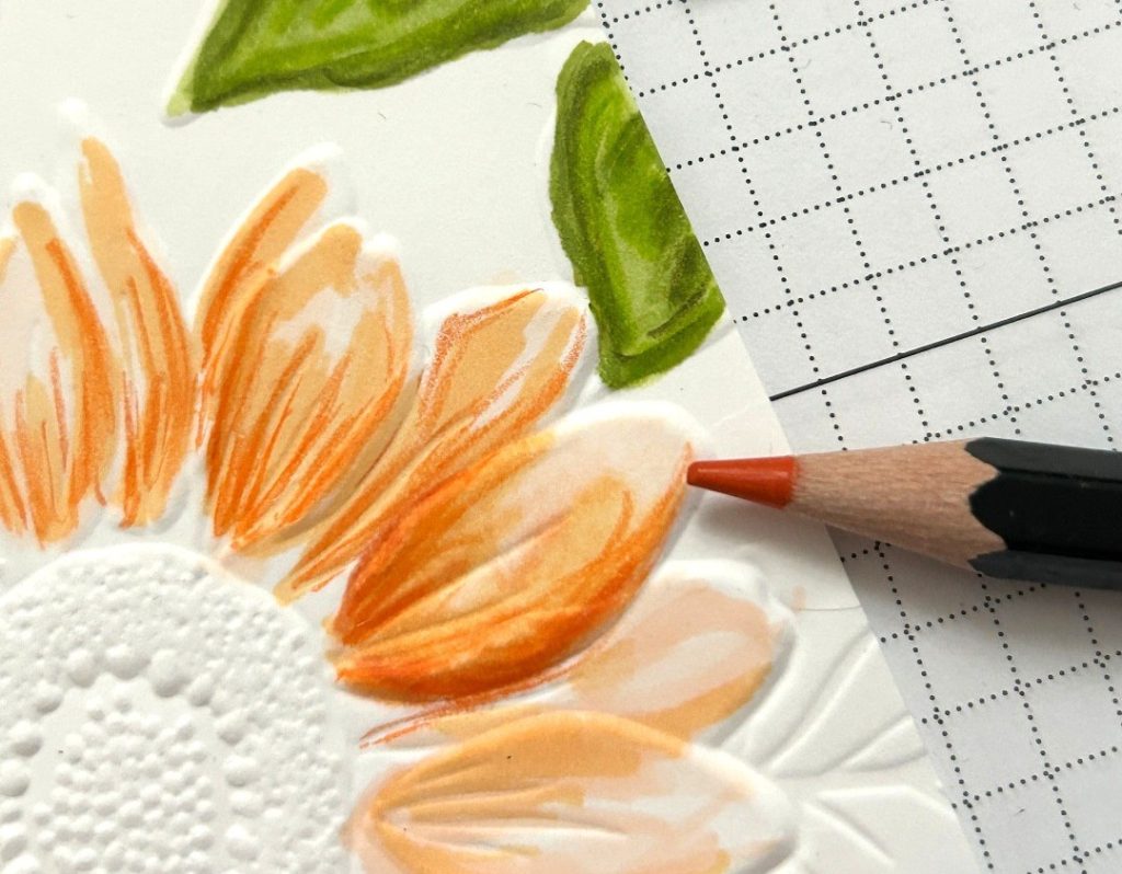 Kim Fee, an Artisan Design Team Member, enhances her dry embossing patterns with watercolor pencils to add soft color, enhanced shading, and beautiful dimensional effects to her DIY craft making. You can see her dry embossing techniques on our Technique Tuesday Instagram series.