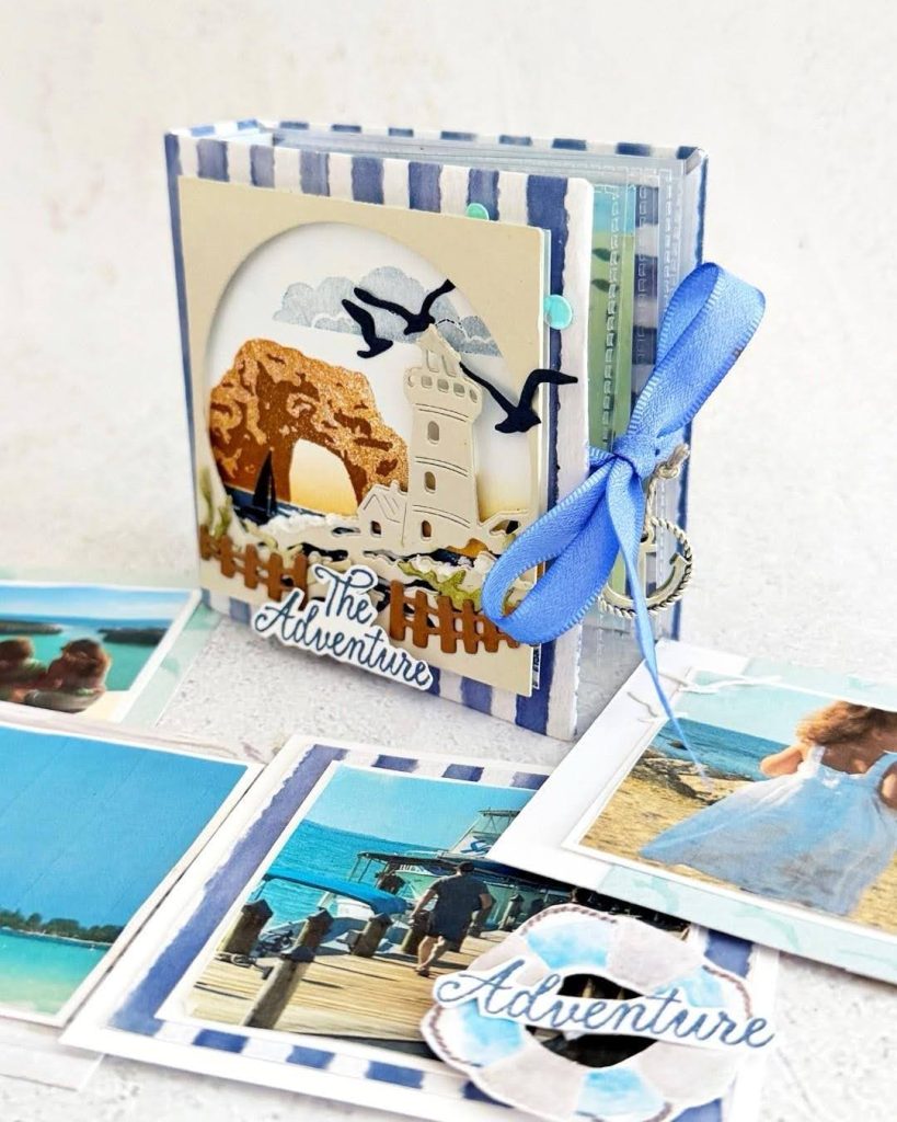 Finished beach-themed mini travel album with ribbon closure and vacation photos.