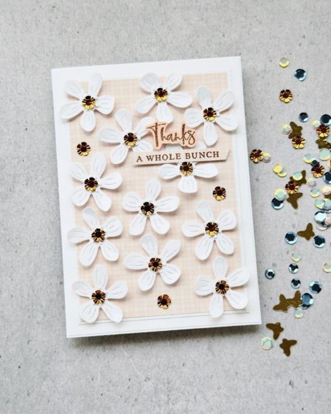 Handmade thank-you card with dimensional white flowers and sparkling embellishments